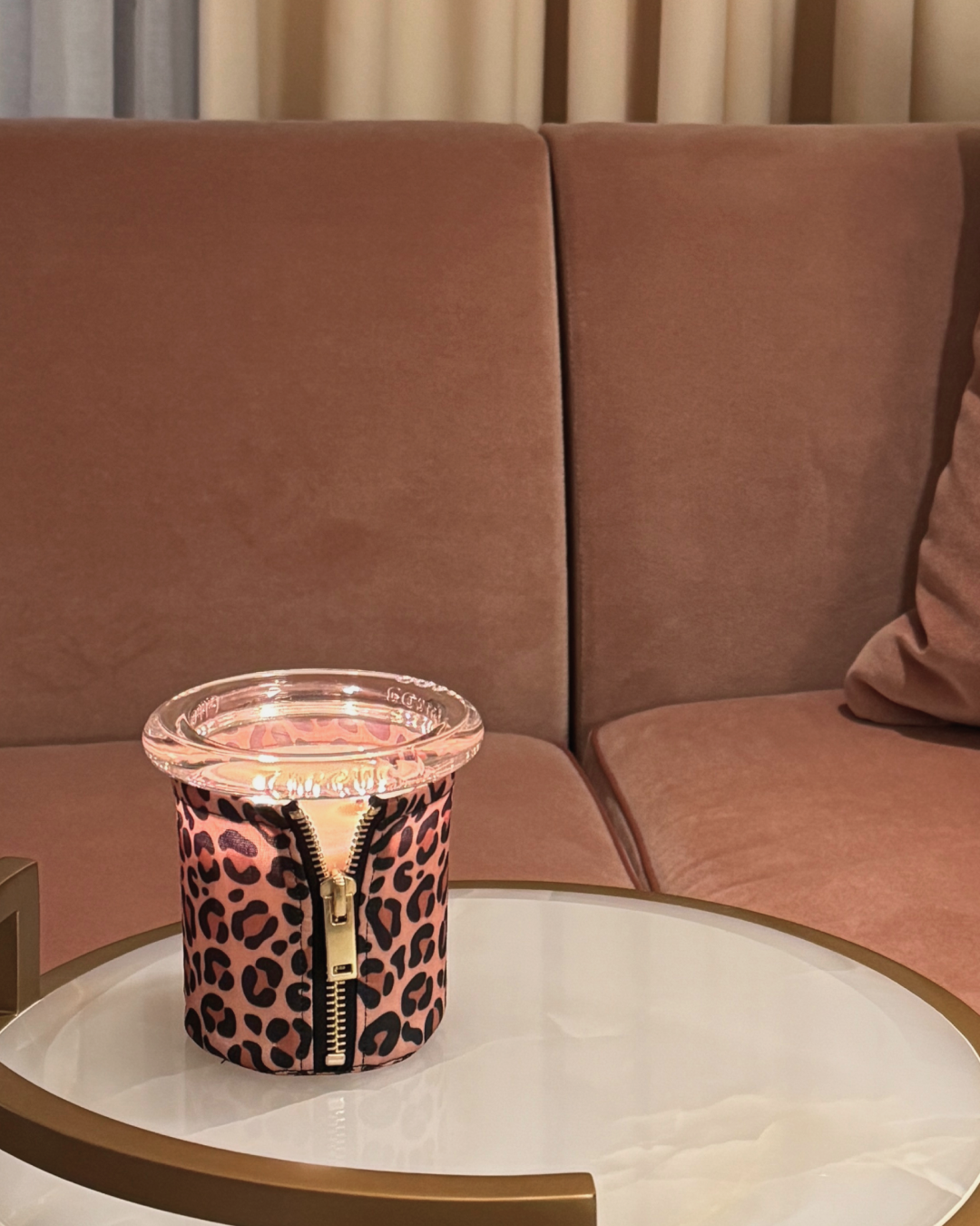 bound leopard candle by circus candles featuring a bold smoky and seductive scent
