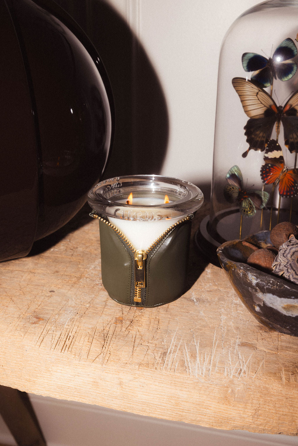 olive scented circus bound candle best selling 