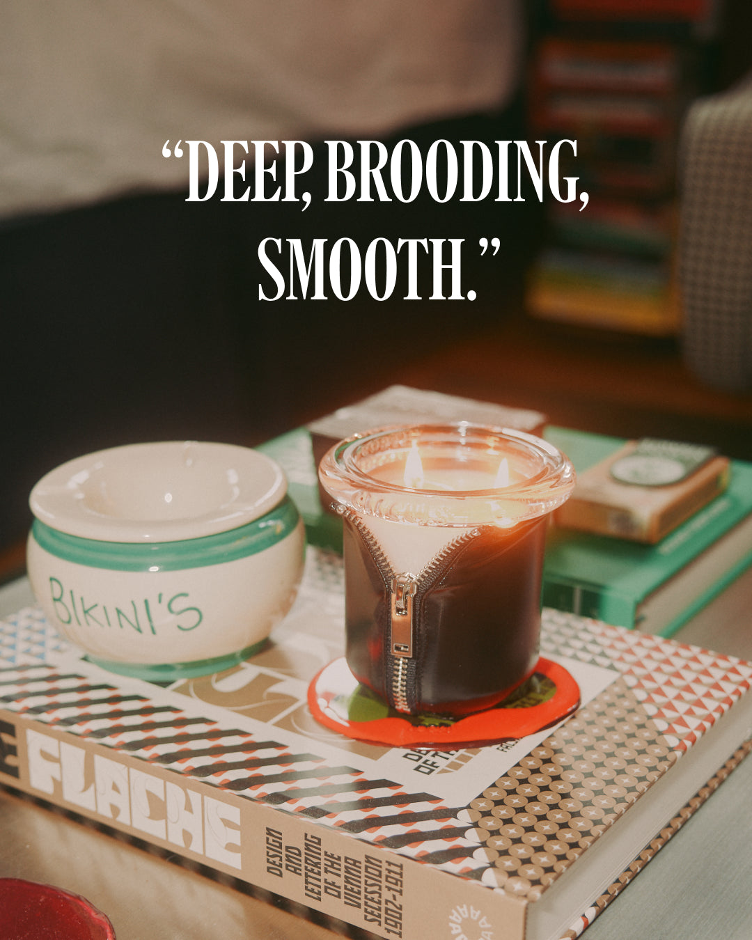 Decorator Conor Burke's nyc apartment featuring circus bound candle in black