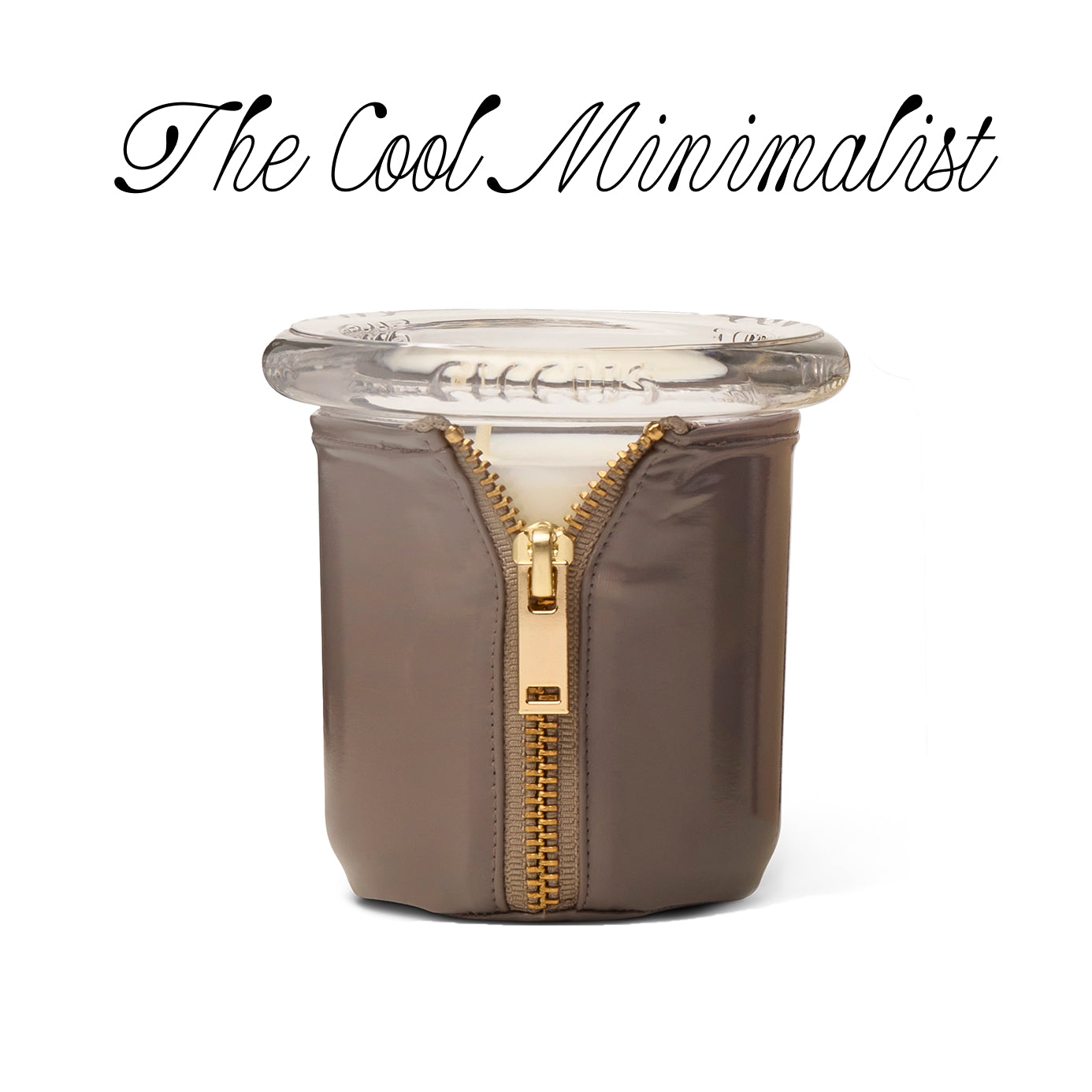 circus gray candle with gold zipper on a white background, featuring 'The Cool Minimalist' text.