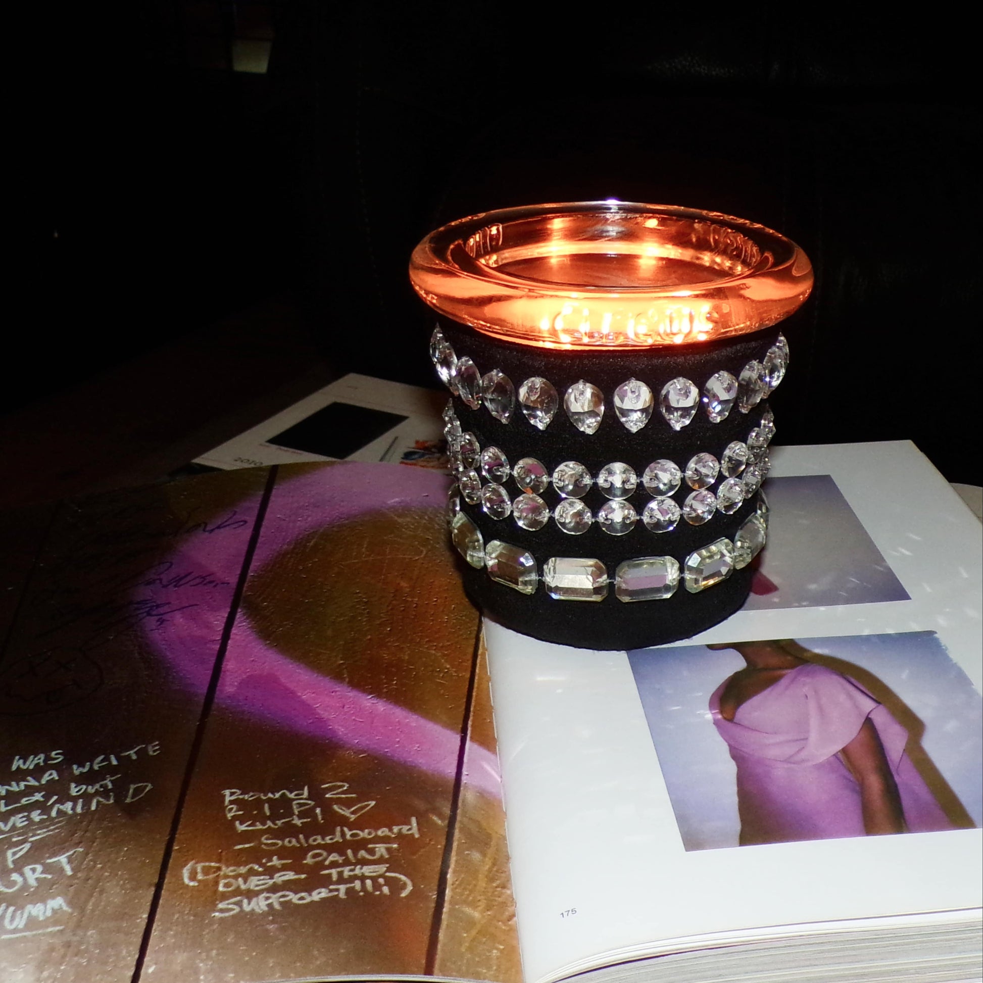 circus candle with crystal wrapped skin on fashion book