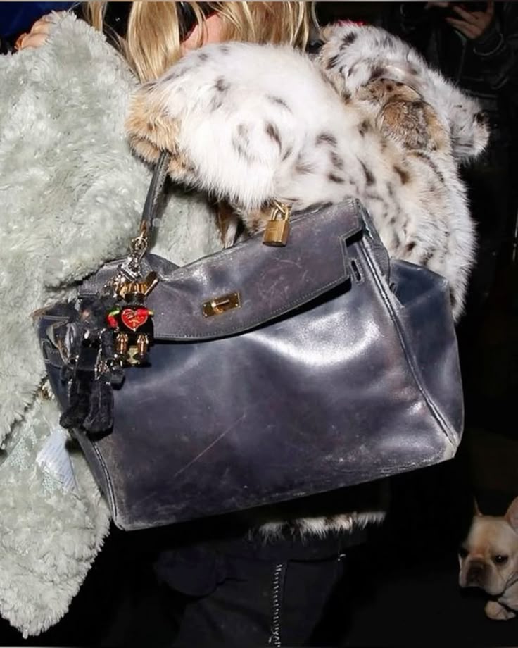 mary kate olsen showing off her beat up birkin hermes circus 